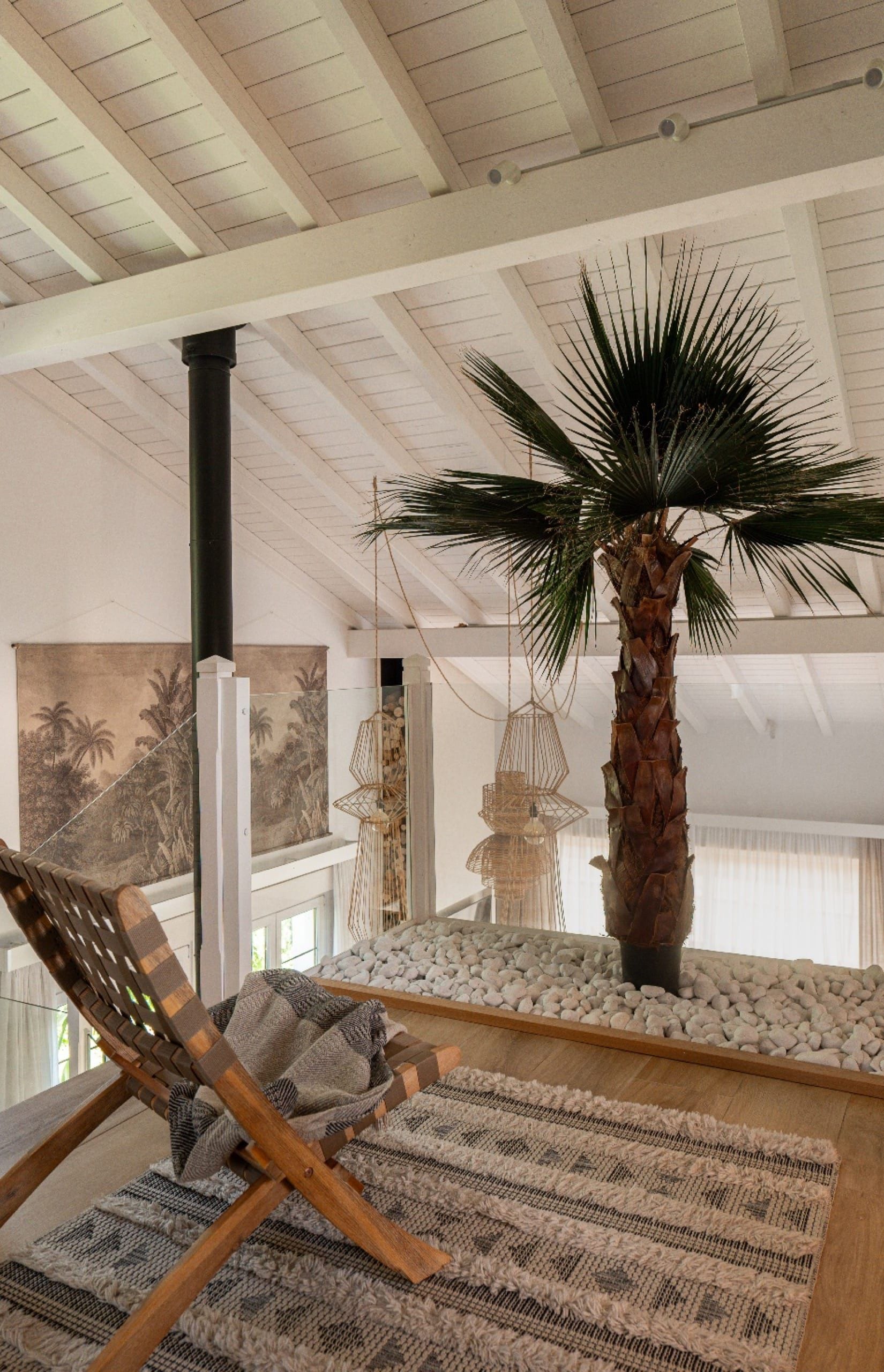 Vegetación y materiales naturales en Casa Palmeral